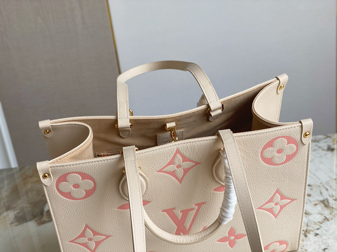 Louis Vuitton OnTheGo Monogram Empreinte Bags M21575