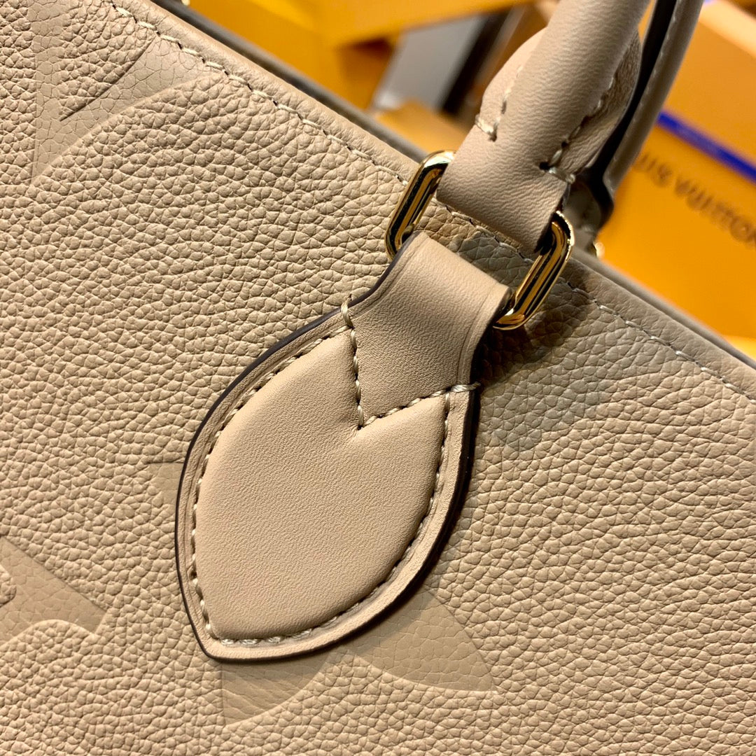 Louis Vuitton OnTheGo MM Tourterelle Empreinte M45607