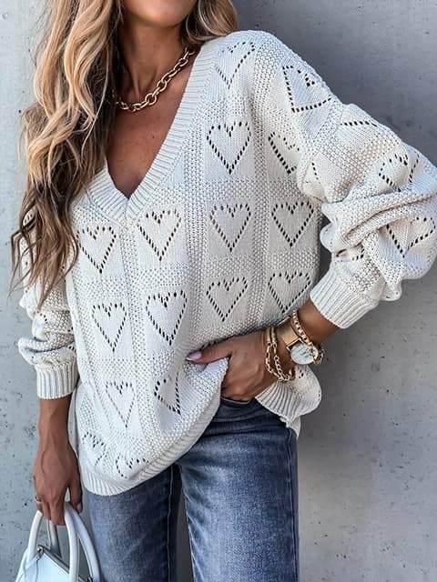 Pull à col en V évidé à cœur uni