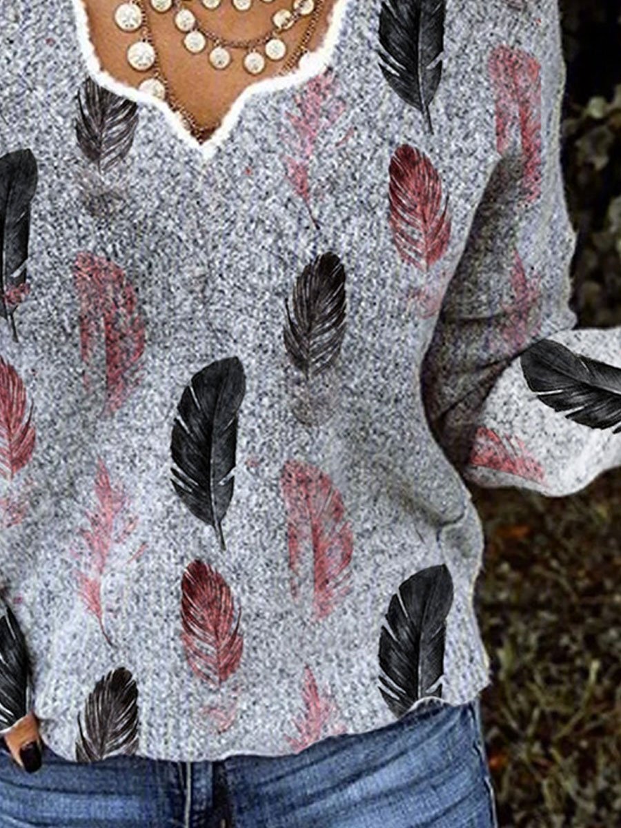 Pull à manches longues et imprimé plumes à col en V