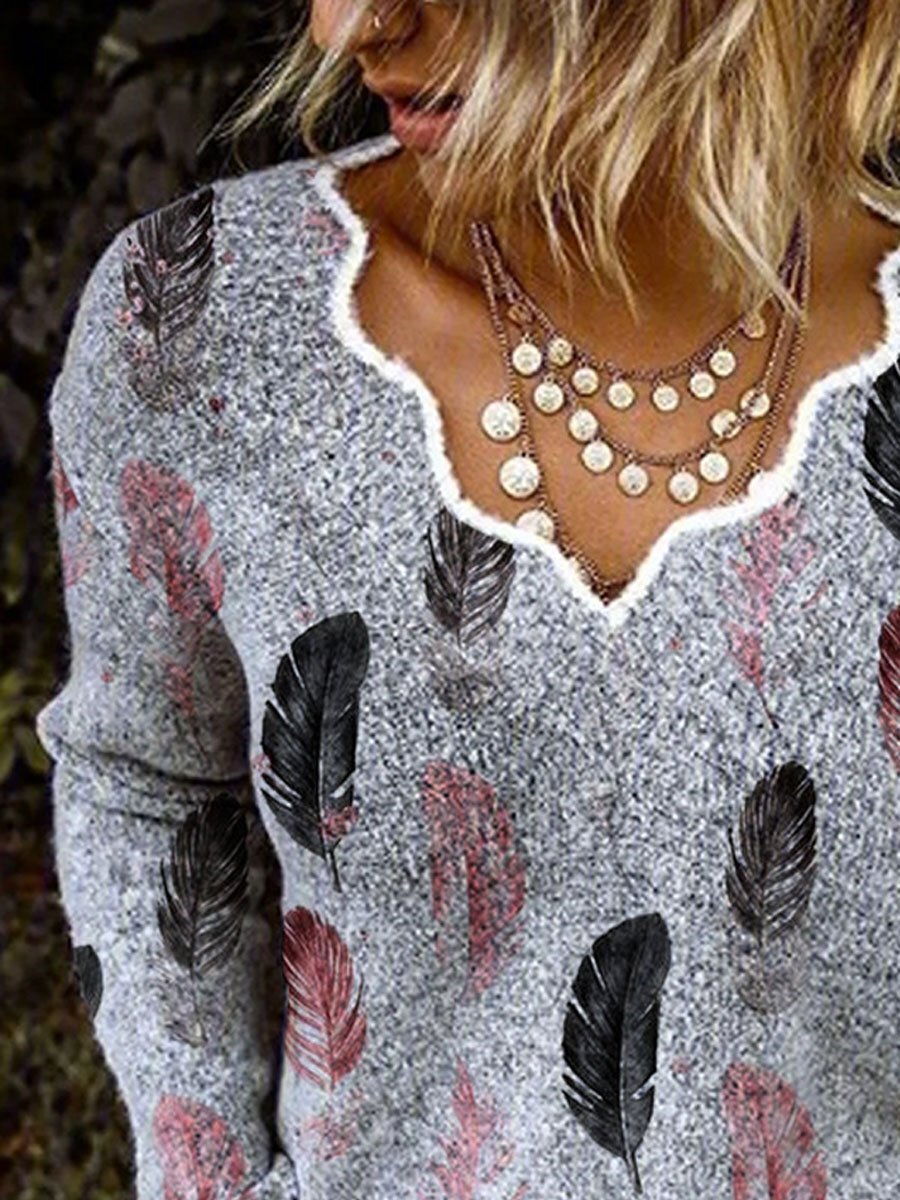 Pull à manches longues et imprimé plumes à col en V