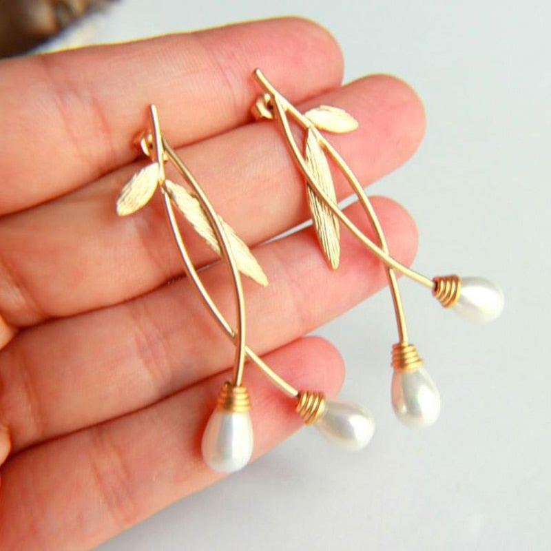 Boucles d'oreilles perle feuille d'or