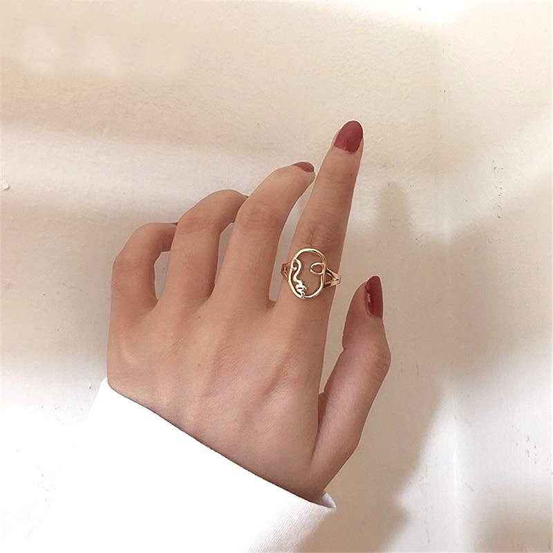 Hollow Abstract Face Ring