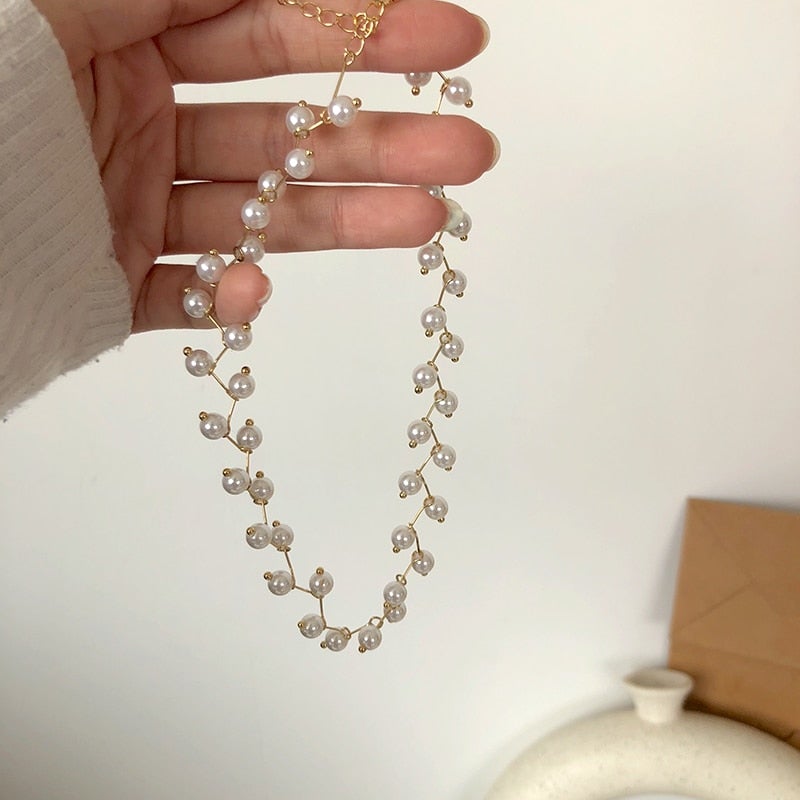 Collier ras de cou en perles de dentelle